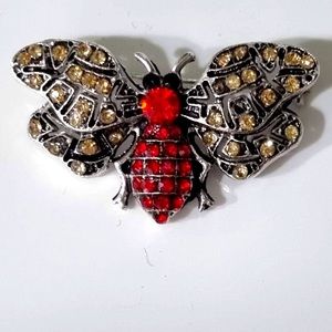 Small brooch . Great to add to clothing, bags , scarfs.